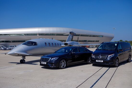Our Mercedes fleet lined up in the rain at dusk
